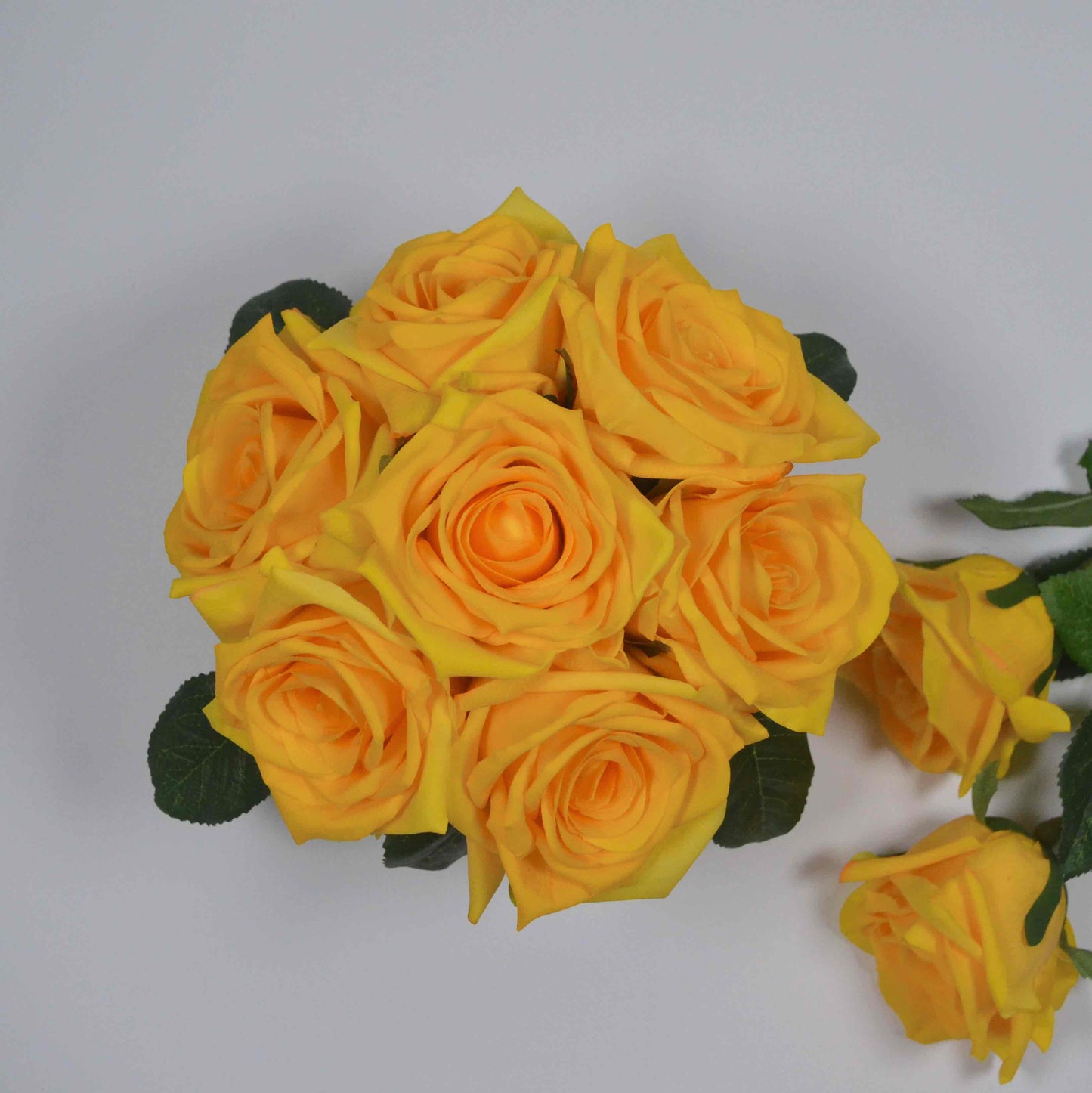 Real touch artificial flower stem yellow rose bouquet in glass vase set in resin illusion water.