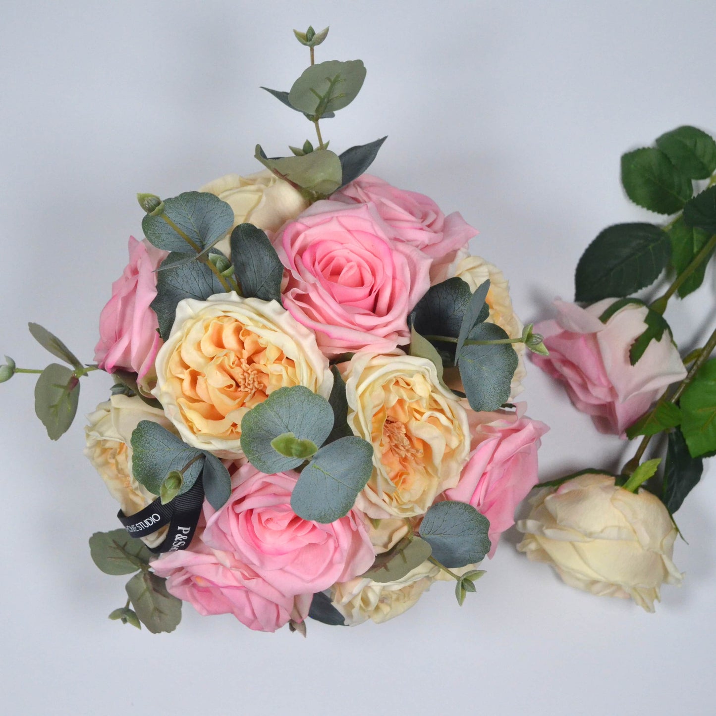 pink and champagne with eucalyptus floral arrangement